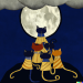 Thumbnail DALL·E 2022-09-01 11.08.43 - tower of cats huddling under a trench coat on a moonlit night, studio ghibli 1982.png 